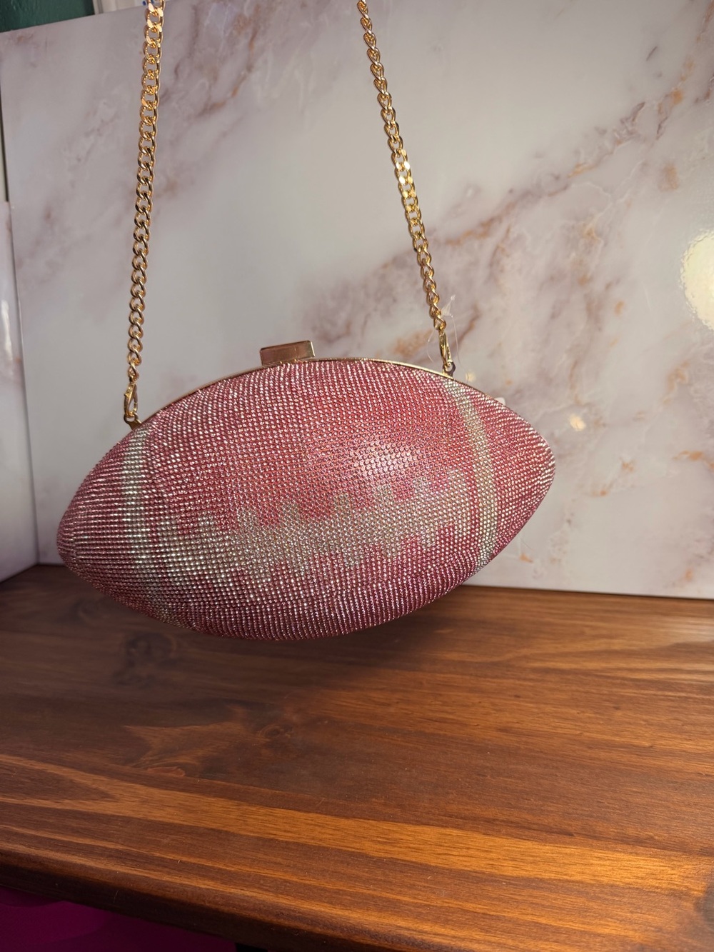 Crystal-Embellished Pink Football Clutch with Gold Chain